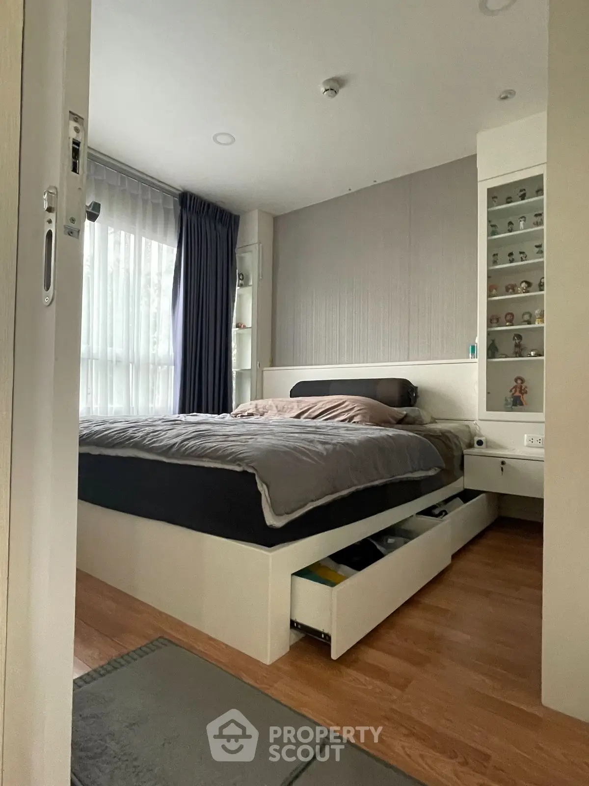 Cozy bedroom with modern design and ample storage space