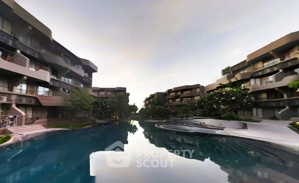 Luxurious residential complex with stunning pool and modern architecture