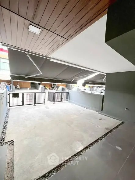 Spacious modern parking area with sleek design and ample lighting