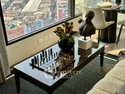 Luxurious living room with city view, elegant decor, and modern furniture