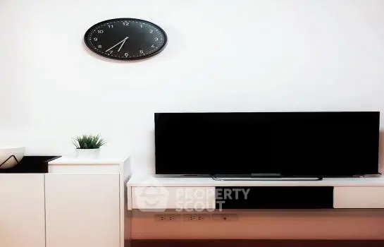 Modern living room with sleek TV setup and stylish decor