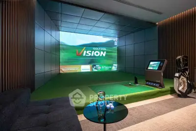 Luxurious indoor golf simulator room with modern design and high-tech equipment, perfect for golf enthusiasts.
