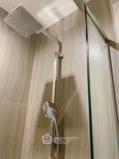 Modern bathroom shower with sleek design and glass partition