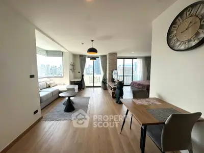 Spacious modern living room with city view and stylish decor