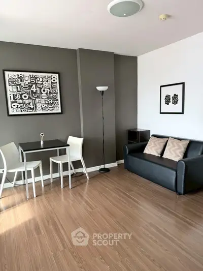 Modern living room with sleek furniture and stylish decor