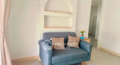 Cozy living room with stylish sofa and modern decor