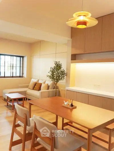 Modern living room with stylish furniture and warm lighting