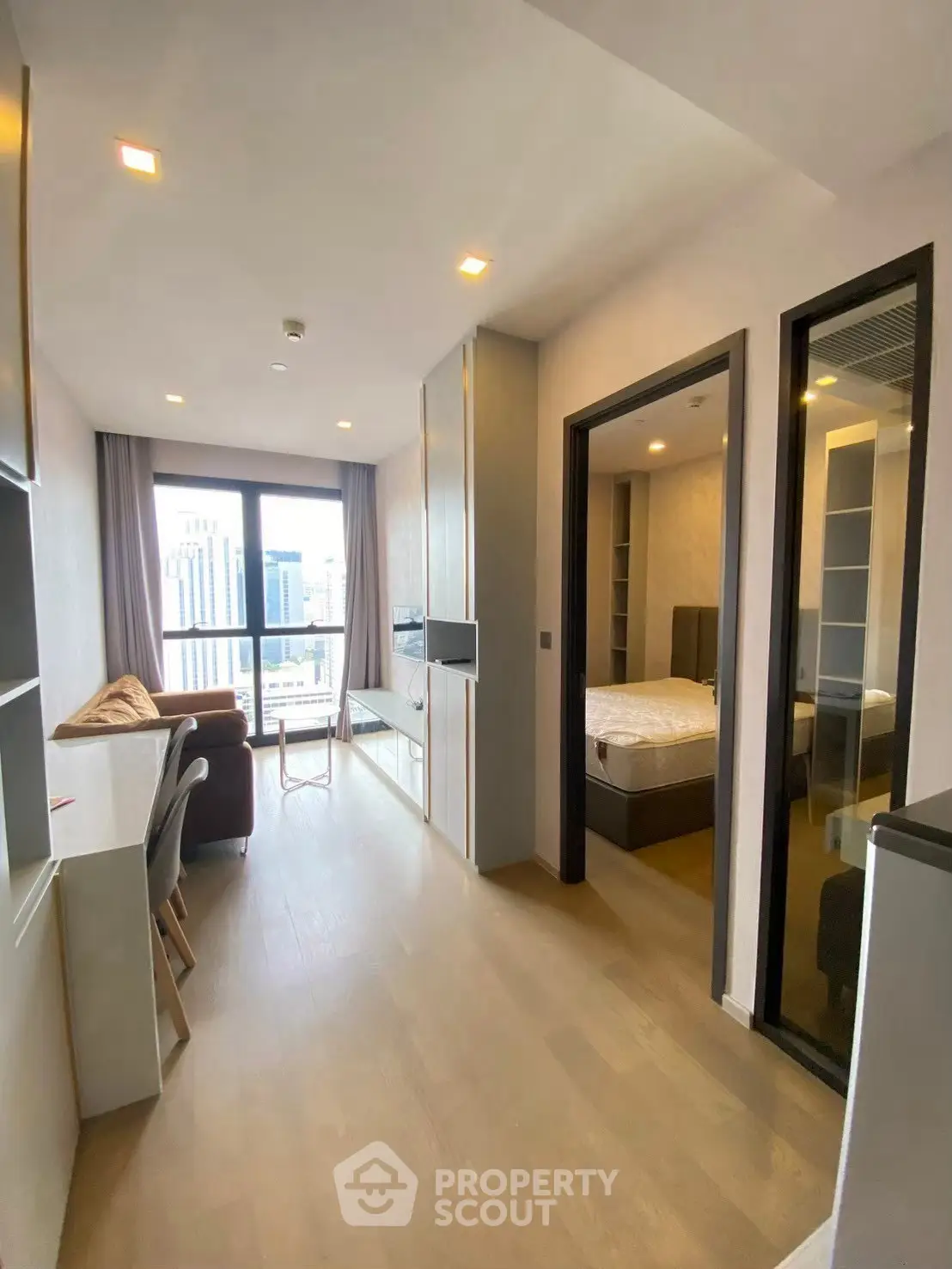 Modern apartment with open living area and city view