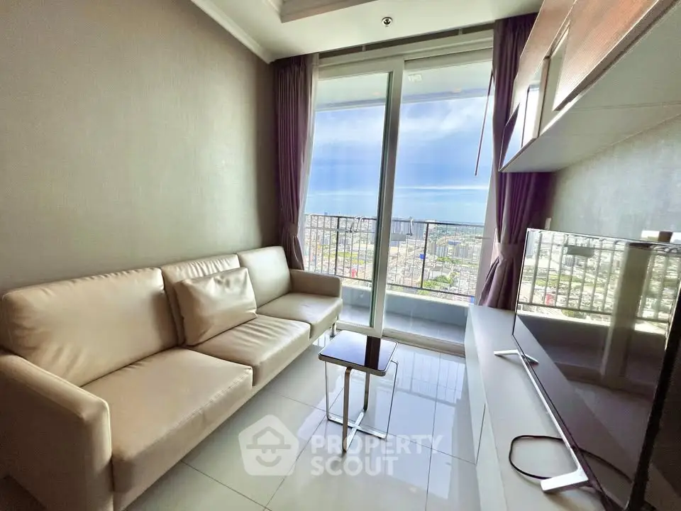 Modern living room with stunning sea view and sleek furnishings