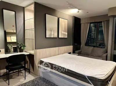 Modern studio apartment with stylish decor and city view