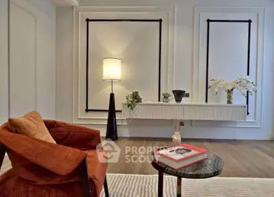 Stylish modern living room with elegant decor and cozy seating area.