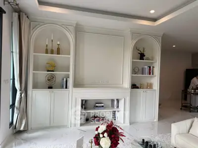 Elegant living room with built-in shelves and modern decor