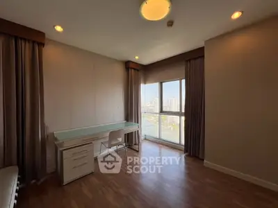 Spacious study room with city view and elegant wooden flooring