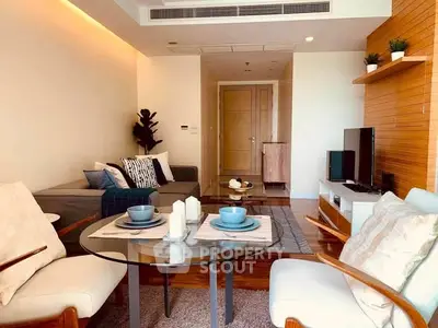Stylish modern living room with cozy seating and elegant decor, perfect for relaxation and entertainment.