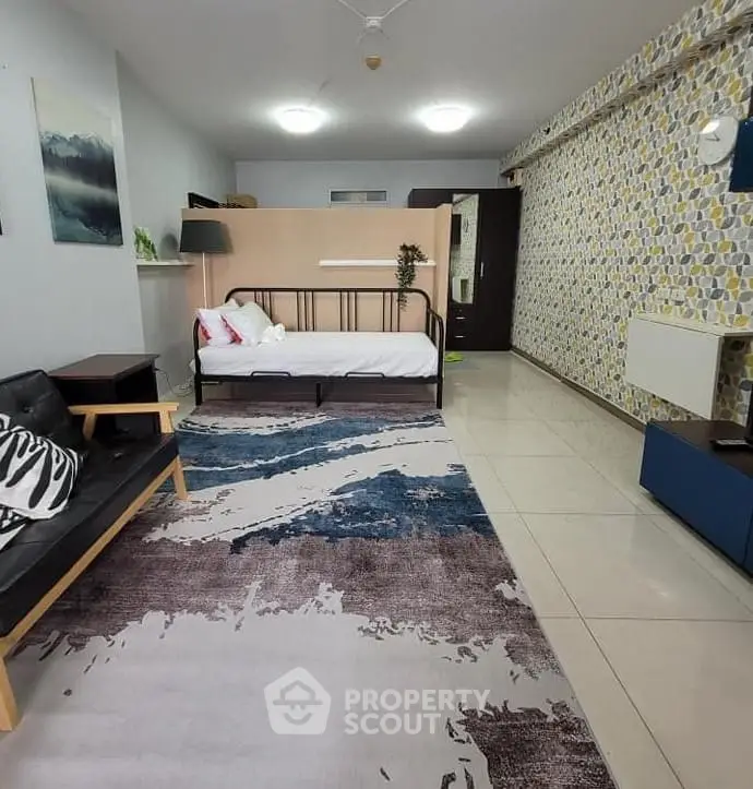 Stylish studio apartment with modern decor and open layout