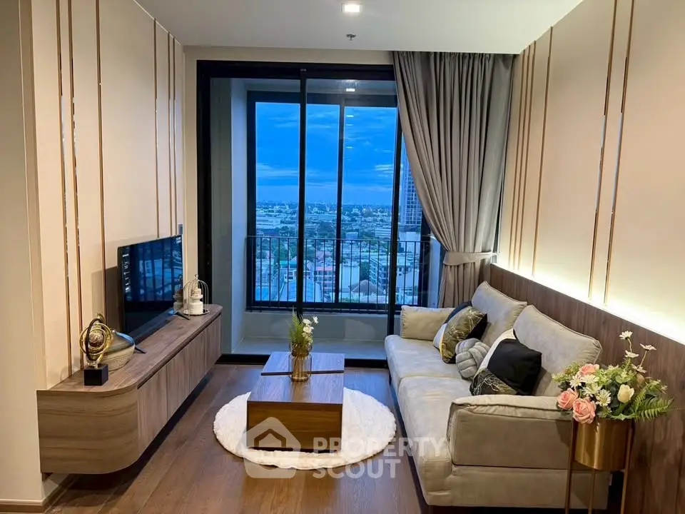 Modern living room with stylish decor and city view balcony.