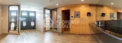 Spacious modern bathroom with sauna and sleek fixtures