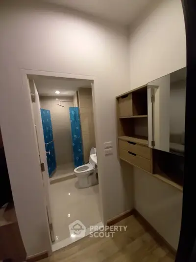 Modern bathroom with sleek design and ample storage space