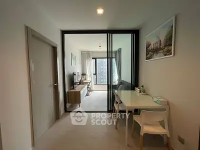 Modern apartment interior with sliding glass doors and stylish decor