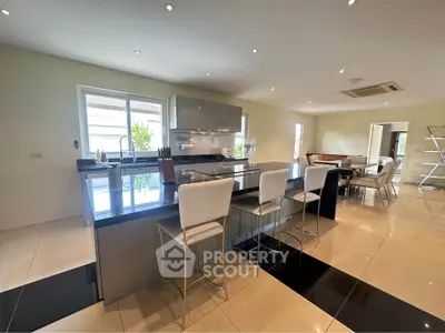 Luxurious modern kitchen with sleek island and open layout