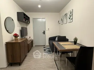 Chic living room with modern decor and stylish furniture in a cozy apartment setting.
