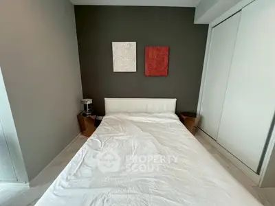 Modern bedroom with minimalist decor and stylish wall art
