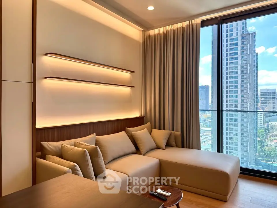 Luxurious living room with modern sofa and stunning city view through large windows.
