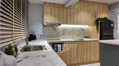 Modern kitchen with sleek wooden cabinetry and marble countertops