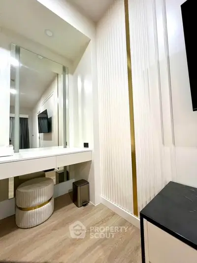 Modern bedroom with elegant vanity and stylish decor