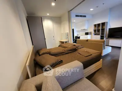 Modern studio apartment with open layout and stylish furnishings