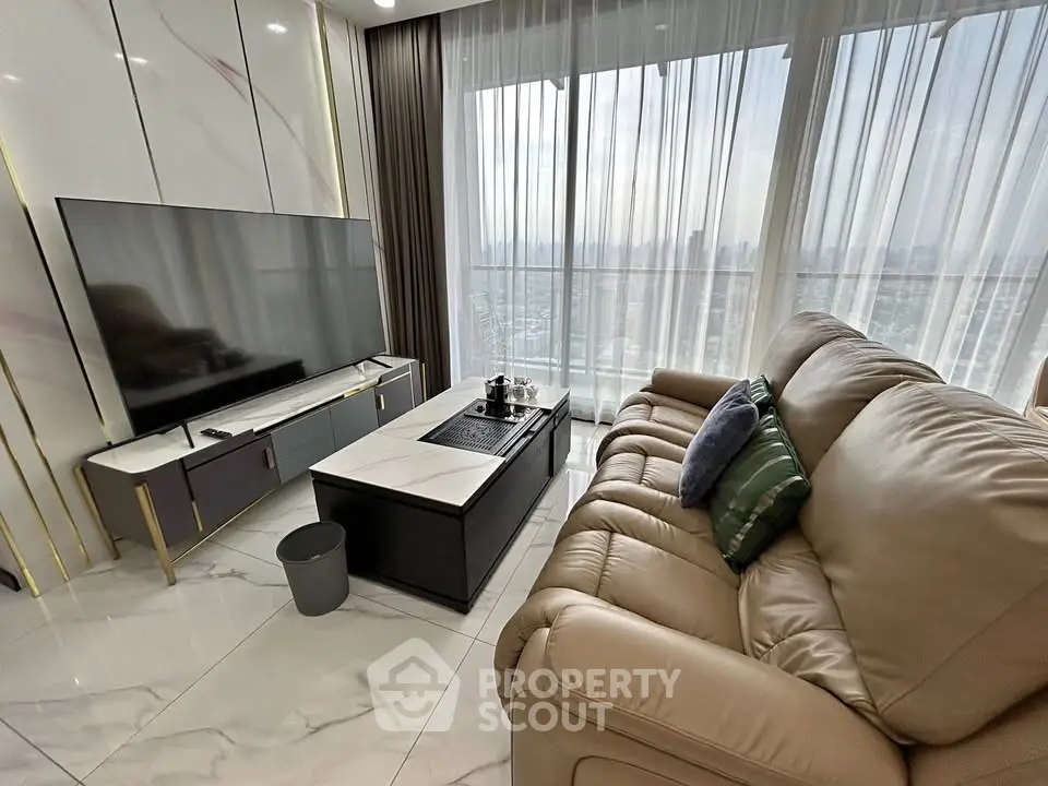Luxurious living room with stunning city view, featuring modern decor and plush seating for ultimate comfort.