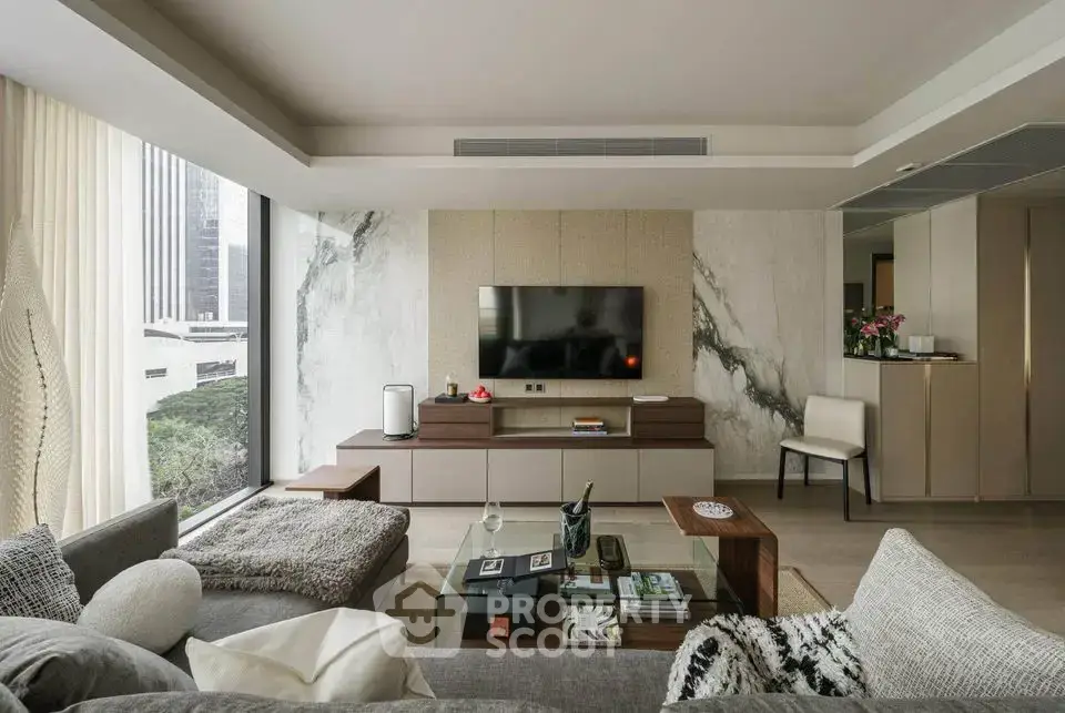 Luxurious modern living room with panoramic city view and elegant decor