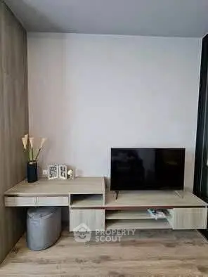 Modern living room with sleek TV stand and minimalist decor