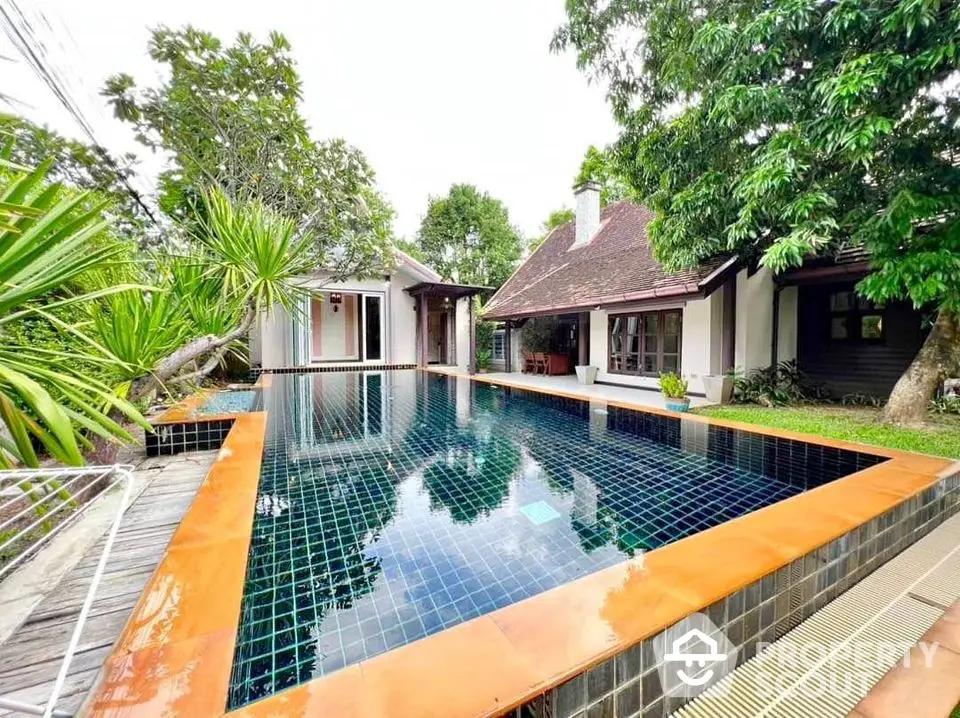 Stunning villa with private pool and lush garden, perfect for luxury living.