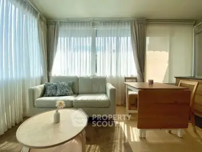 Bright and airy living room with modern furniture and large windows