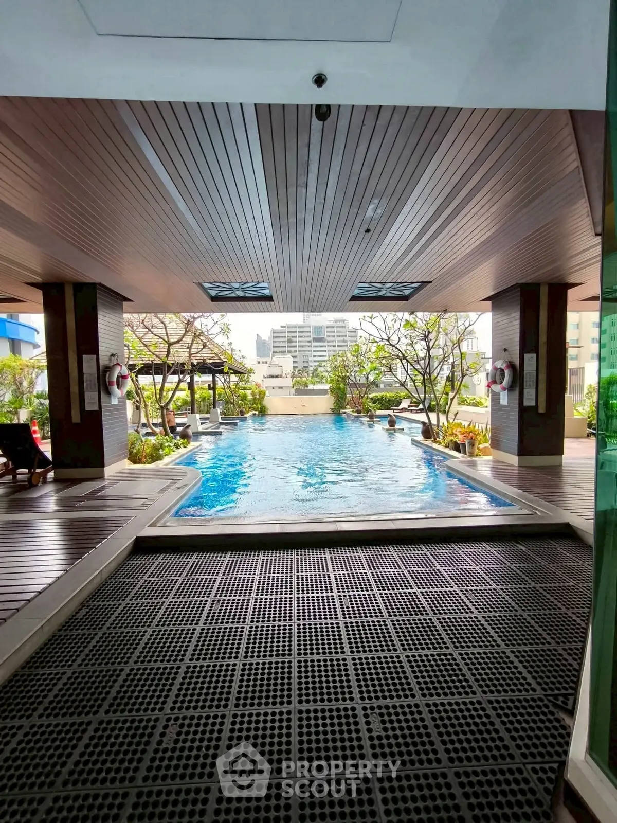 Luxurious rooftop pool with city view and modern design