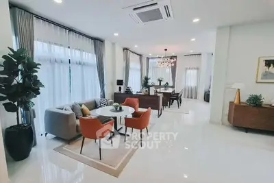 Spacious modern living room with elegant decor and ample natural light