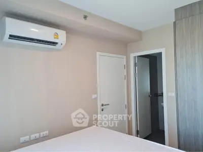 Modern bedroom with air conditioning and minimalist design