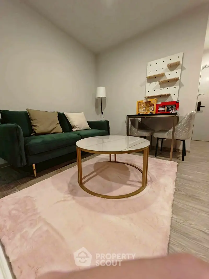 Cozy living room with modern decor and plush rug