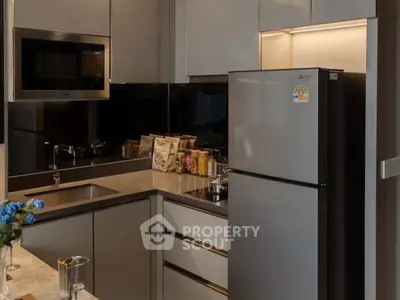 Modern kitchen with sleek appliances and stylish cabinetry