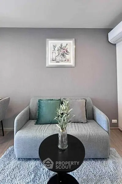 Stylish modern living room with cozy sofa and elegant decor