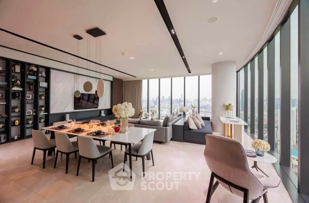 Luxurious modern living room with panoramic city views and elegant dining area.