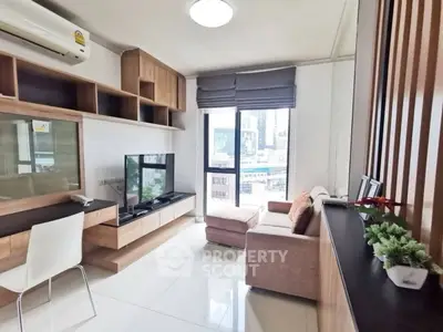 Modern living room with sleek furniture and city view, perfect for urban living.