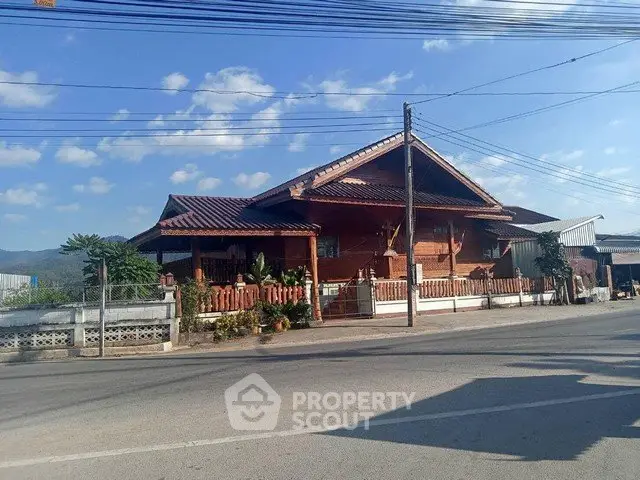 Charming wooden house with traditional design and spacious porch in a serene neighborhood.