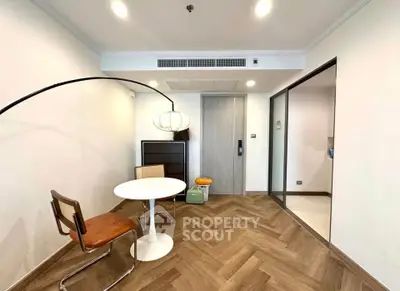 Modern living room with stylish furniture and elegant lighting in a contemporary apartment.
