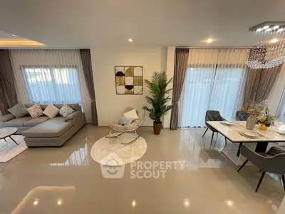 Spacious modern living room with elegant dining area and stylish decor