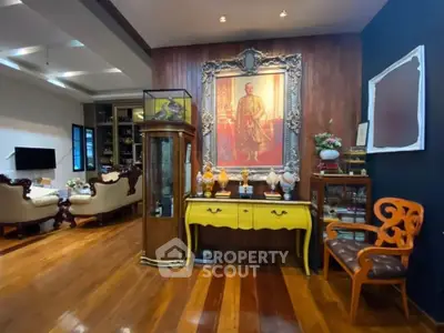Elegant living room with wooden floors and classic furniture