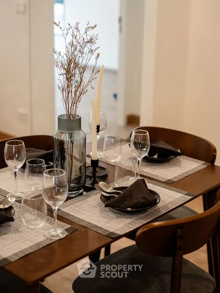Elegant dining area with modern table setting and stylish decor