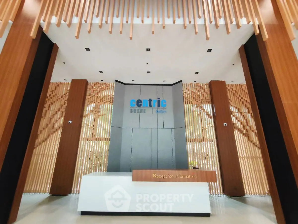 Modern building entrance with stylish wooden accents and sleek design