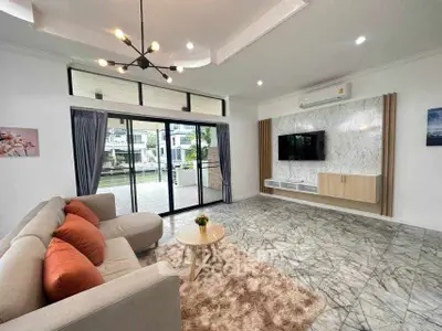 Spacious modern living room with marble flooring and stylish decor